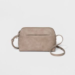 NWT Crossbody bag with zip closure.